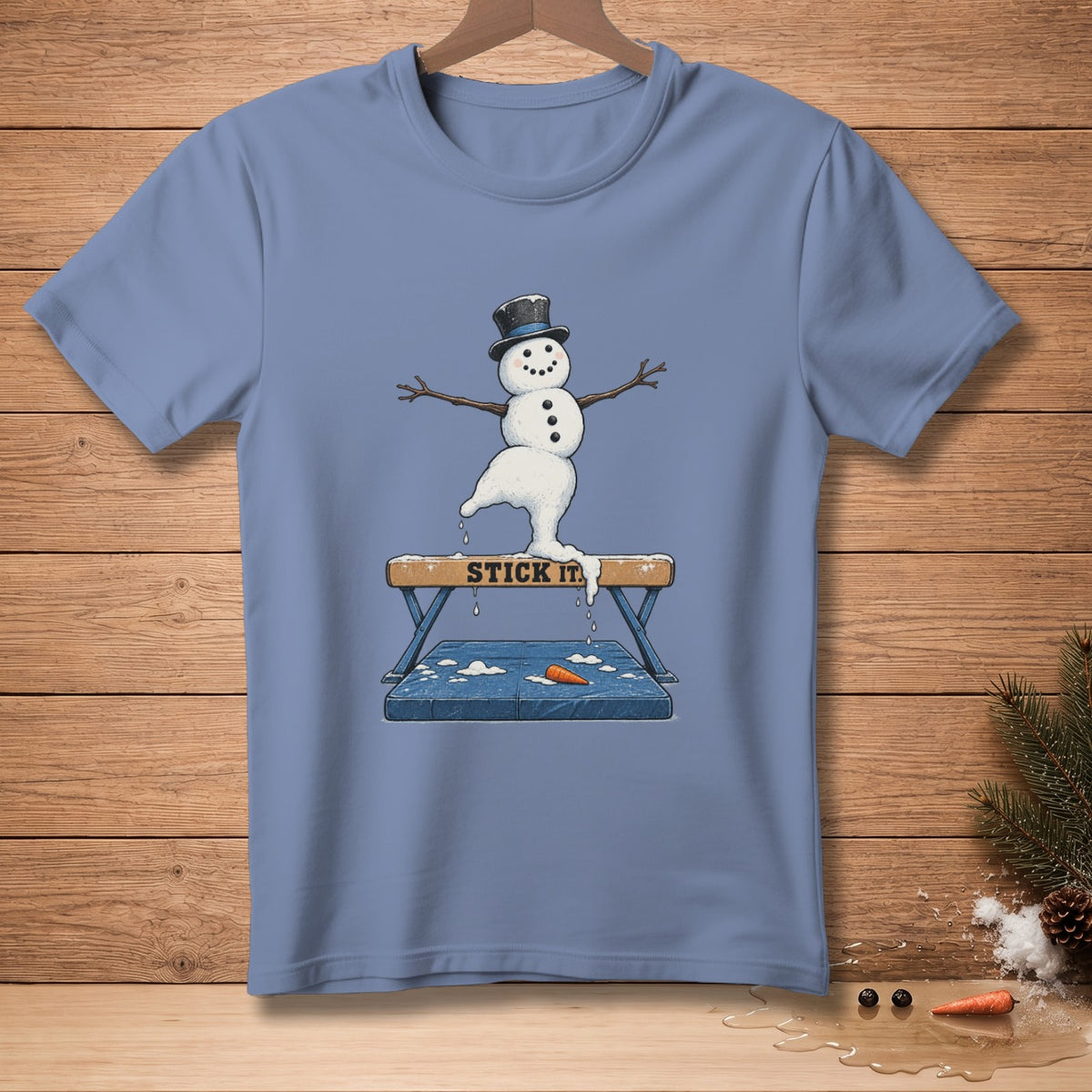 Snowman doing a gymnastics balance beam pose with "STICK IT" text.