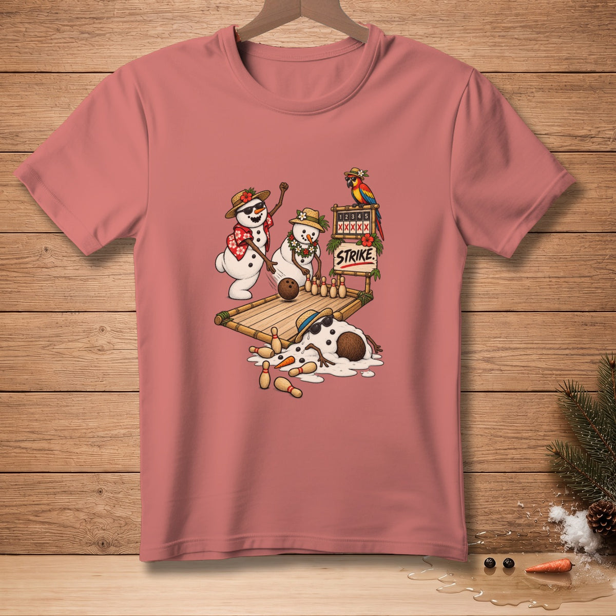 Snowmen playing bowling with a parrot and "STRIKE" text on a t-shirt.
