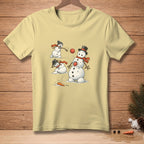 Light yellow t-shirt with cartoon snowmen playing in the snow.