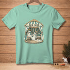 T-shirt with snowmen under a cabana that reads "OUR SPOT".