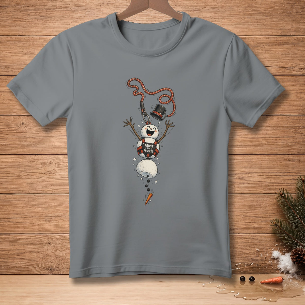 Gray t-shirt with a melting snowman graphic that says "TRUST THE PROCESS."