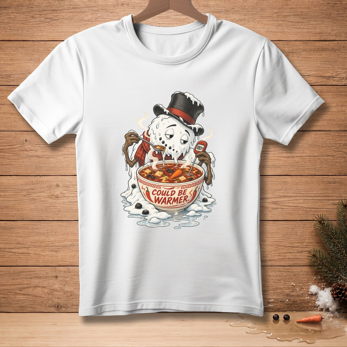 White t-shirt with melting snowman eating ramen that says "Could Be Warmer."
