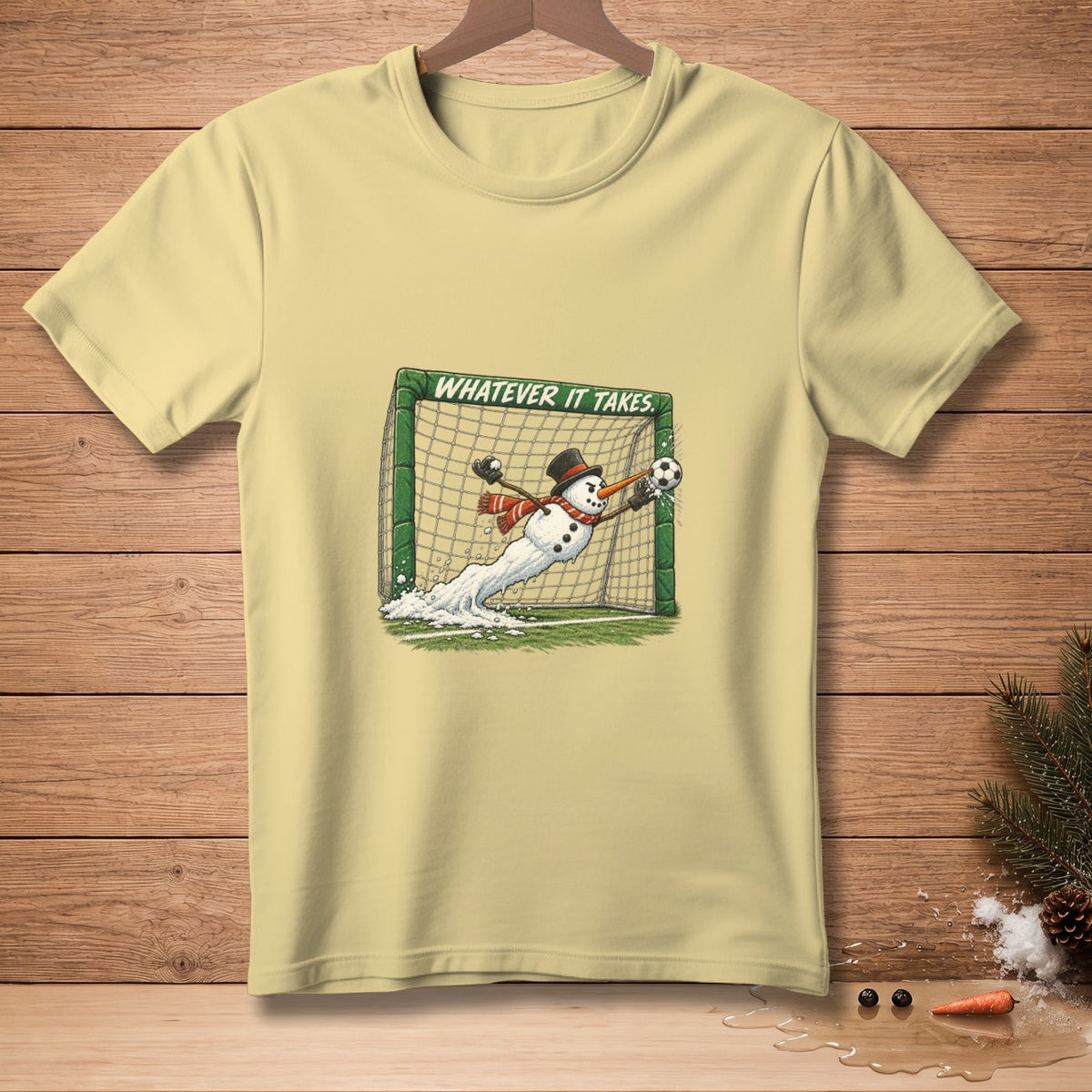 Snowman in goalie gear diving for soccer ball, text reads "Whatever It Takes."