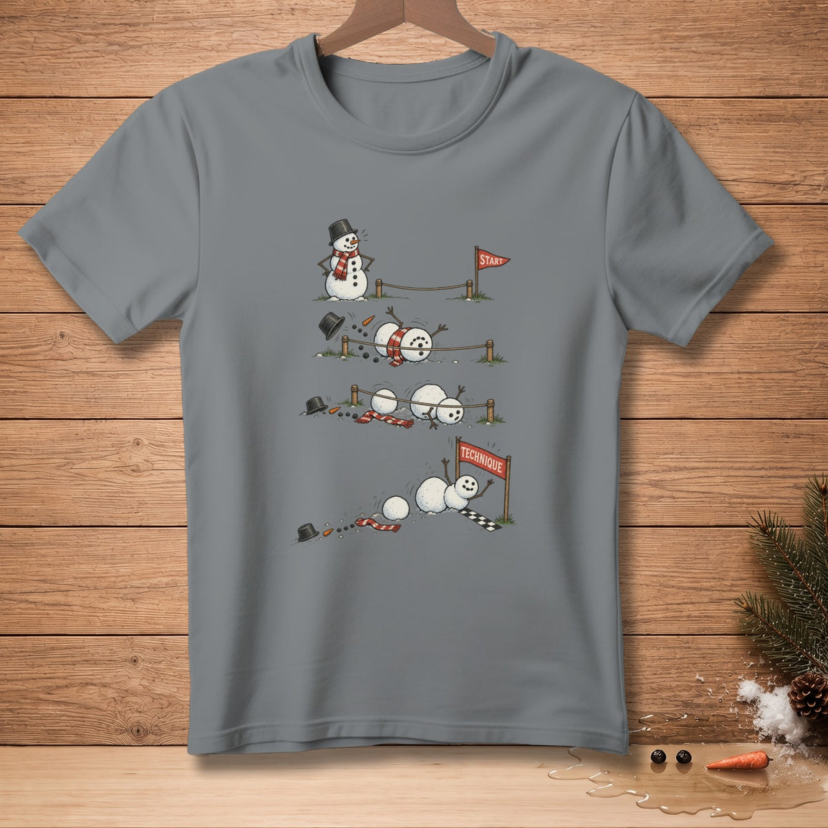T-shirt graphic of snowmen attempting a race, with one succeeding.