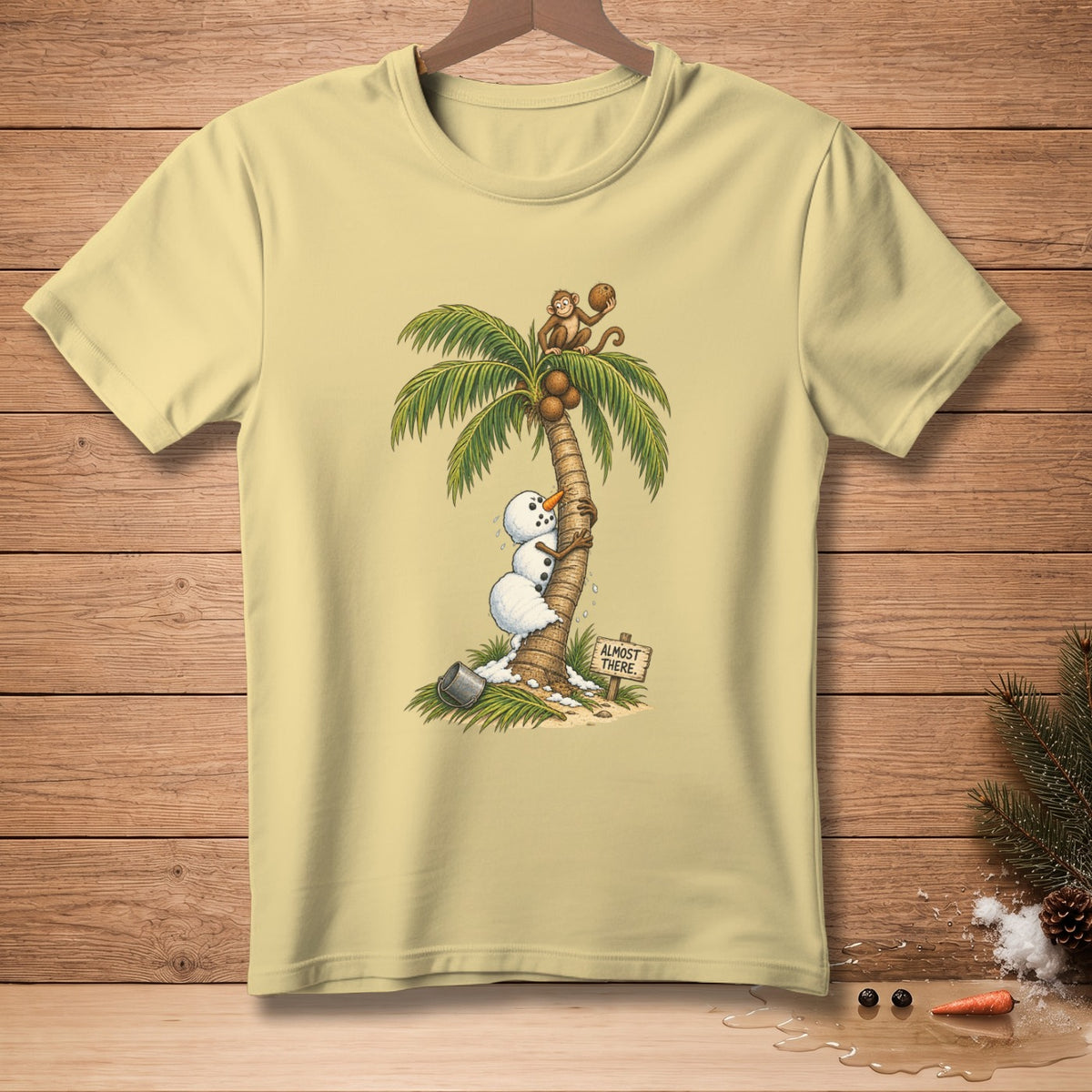 Snowmen climbing a palm tree, with a monkey at the top, and a sign that says "Almost There".