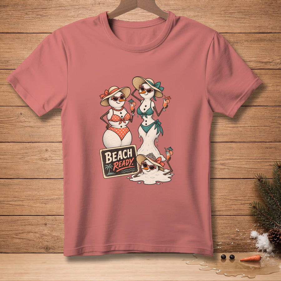 T-shirt graphic with two snowmen in swimsuits and a melting snowman holding drinks, with "Beach Ready" sign.