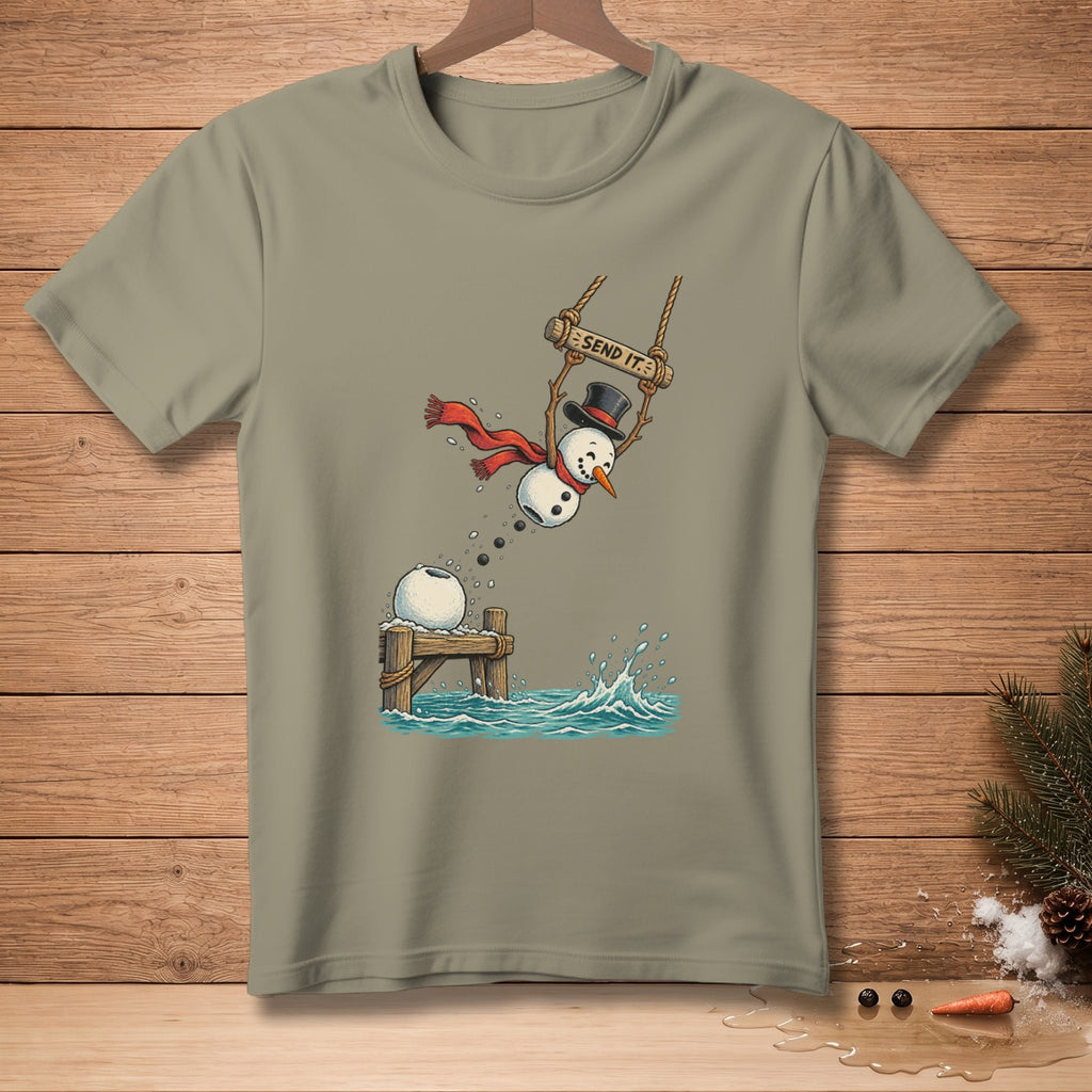 Snowman on swing with "Send It" sign jumping into water off wooden dock.