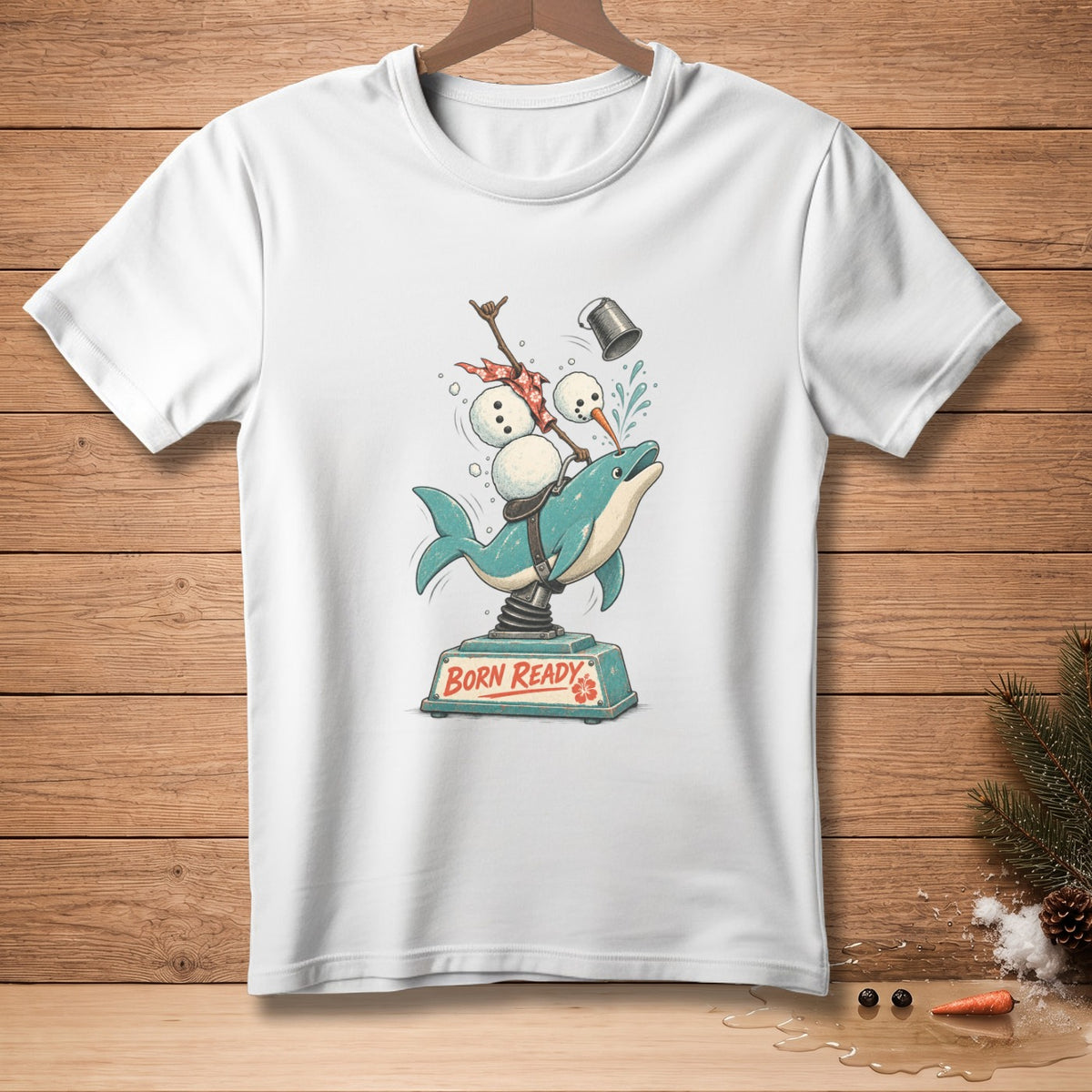Cartoon of a snowman riding a spring-mounted dolphin with "BORN READY" text.