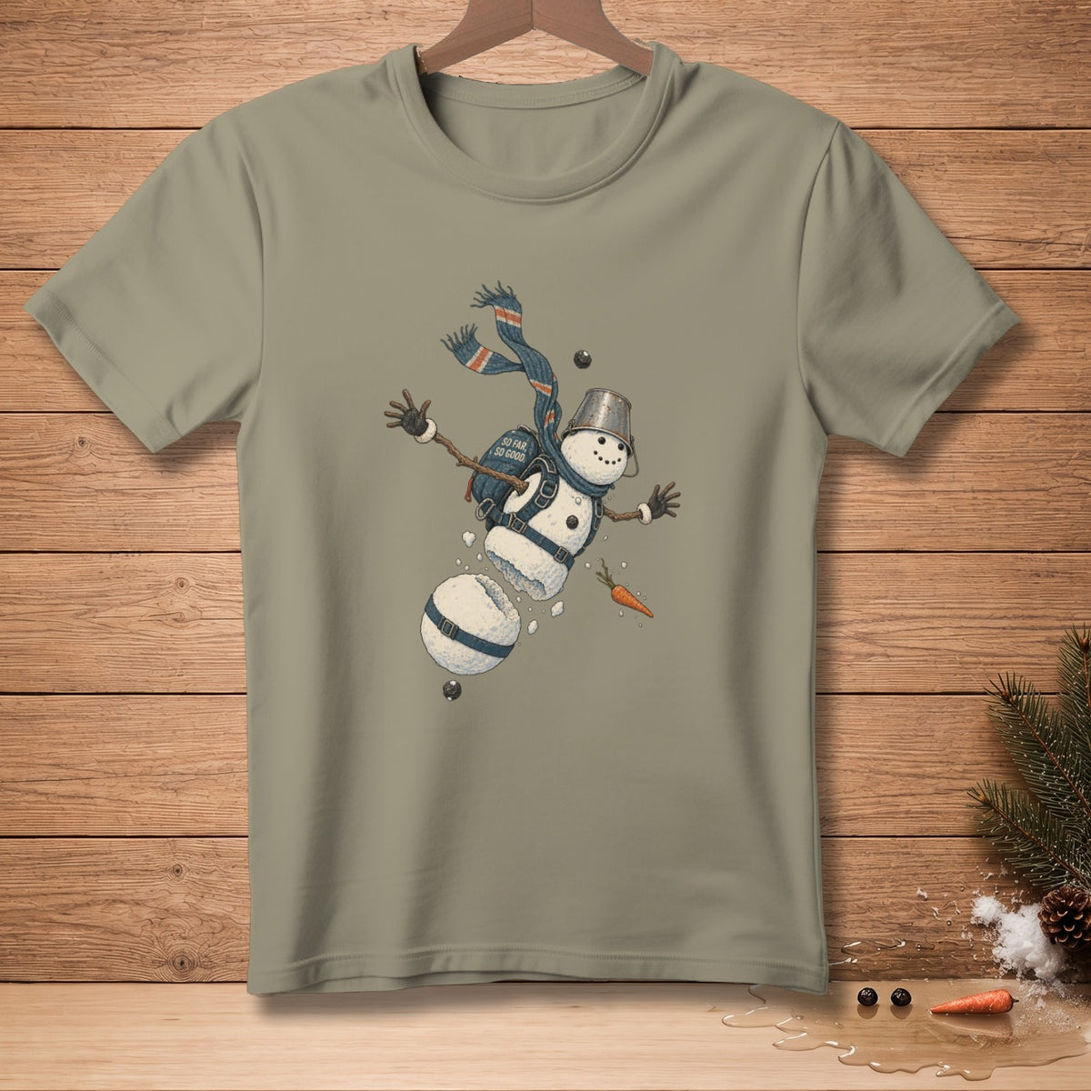 T-shirt with a cartoon snowman breaking apart with text "So Far So Good".