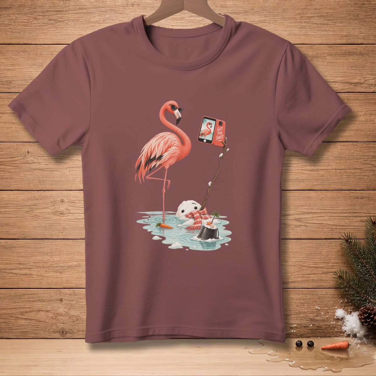 Flamingo takes selfie with melting snowman in puddle, text says "Got the shot".
