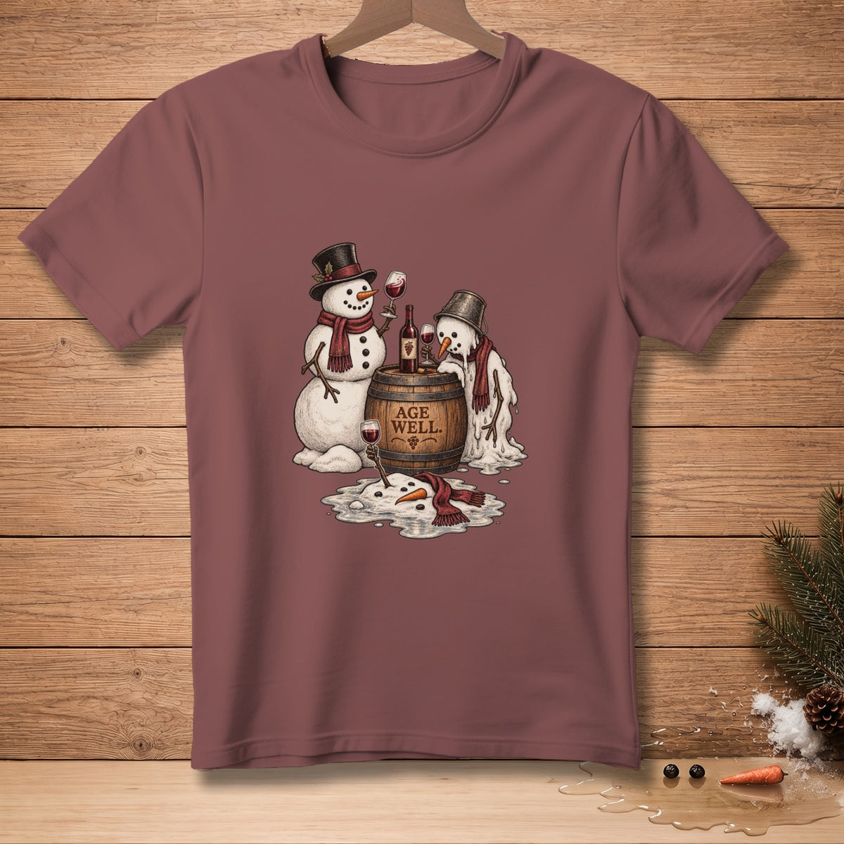 Two snowmen with wine on a barrel that says "Age Well".
