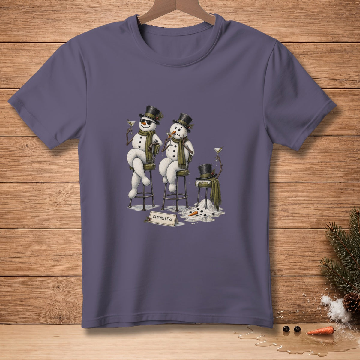 Two snowmen in top hats and scarves drink martinis, with a melting snowman in the foreground.
