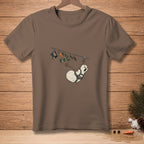 Funny snowman on zipline with scared expression, t-shirt design.